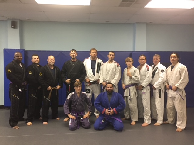 Students and instructors lined up together on the mats at Tampa Jiu-Jitsu