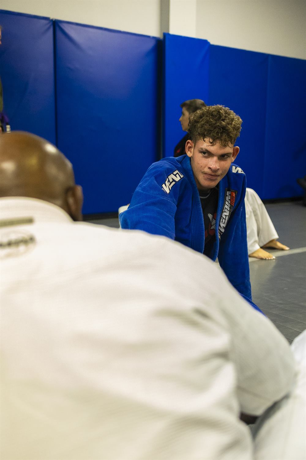 A student watching class at Tampa Jiu-Jitsu