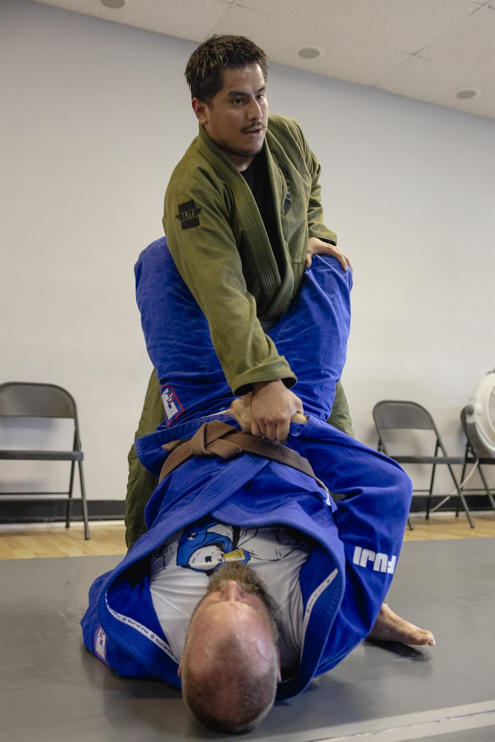 A student receiving personalized coaching on technique