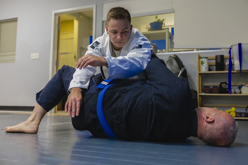 Students training Jiu-Jitsu under the Team Balance banner in Tampa
