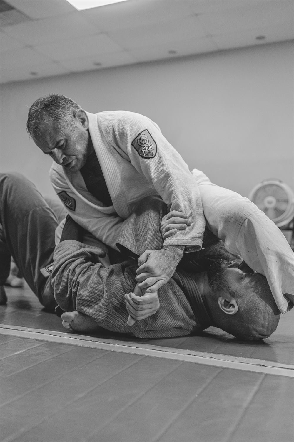 A student working a submission during Team Balance training