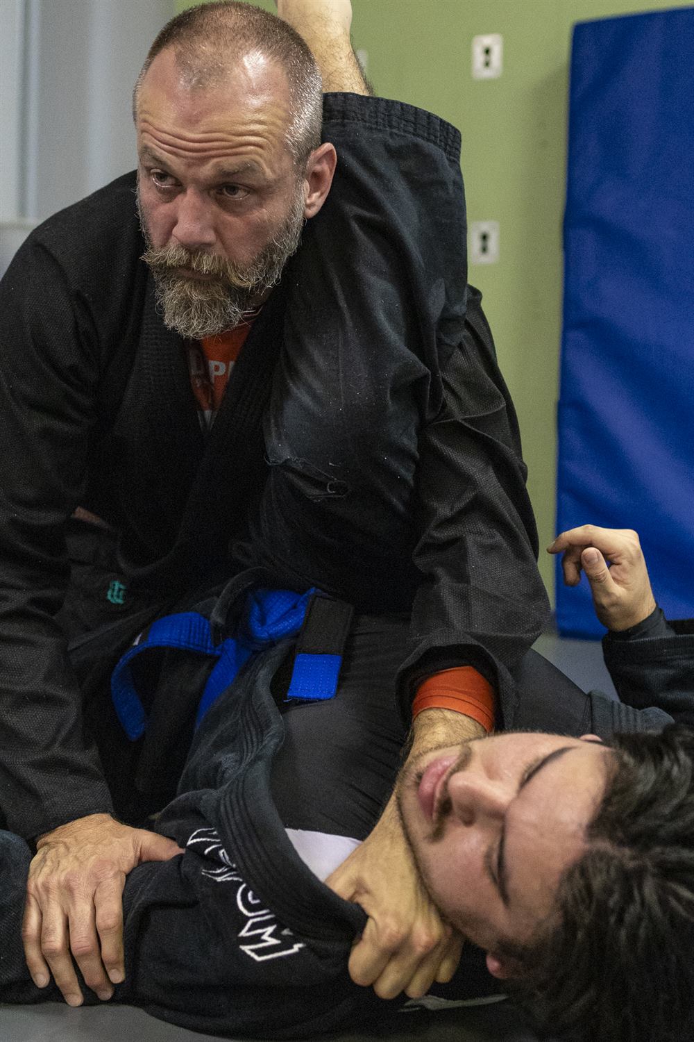 A Tampa Jiu-Jitsu student on the mat between rounds