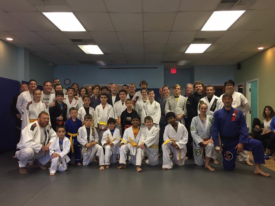 Kids and adult students together on the mats at Tampa Jiu-Jitsu