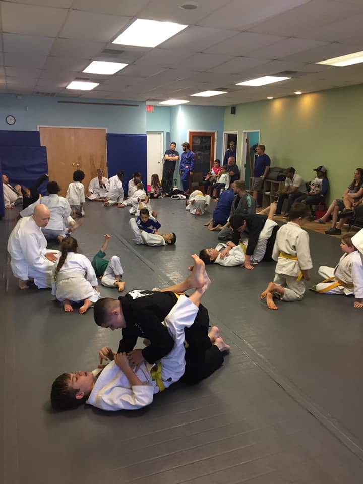Kids drilling Jiu-Jitsu with partners during a kids class at Tampa Jiu-Jitsu